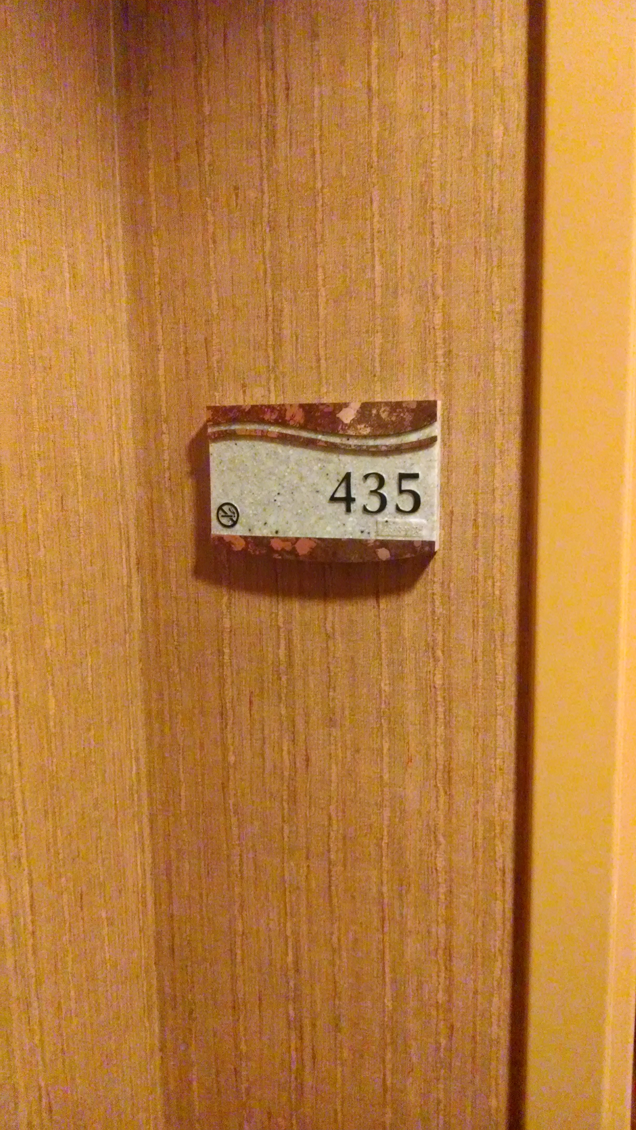 Picture of hotel room number sign