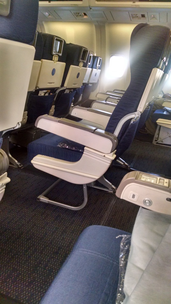 Rows of empty airplane seats