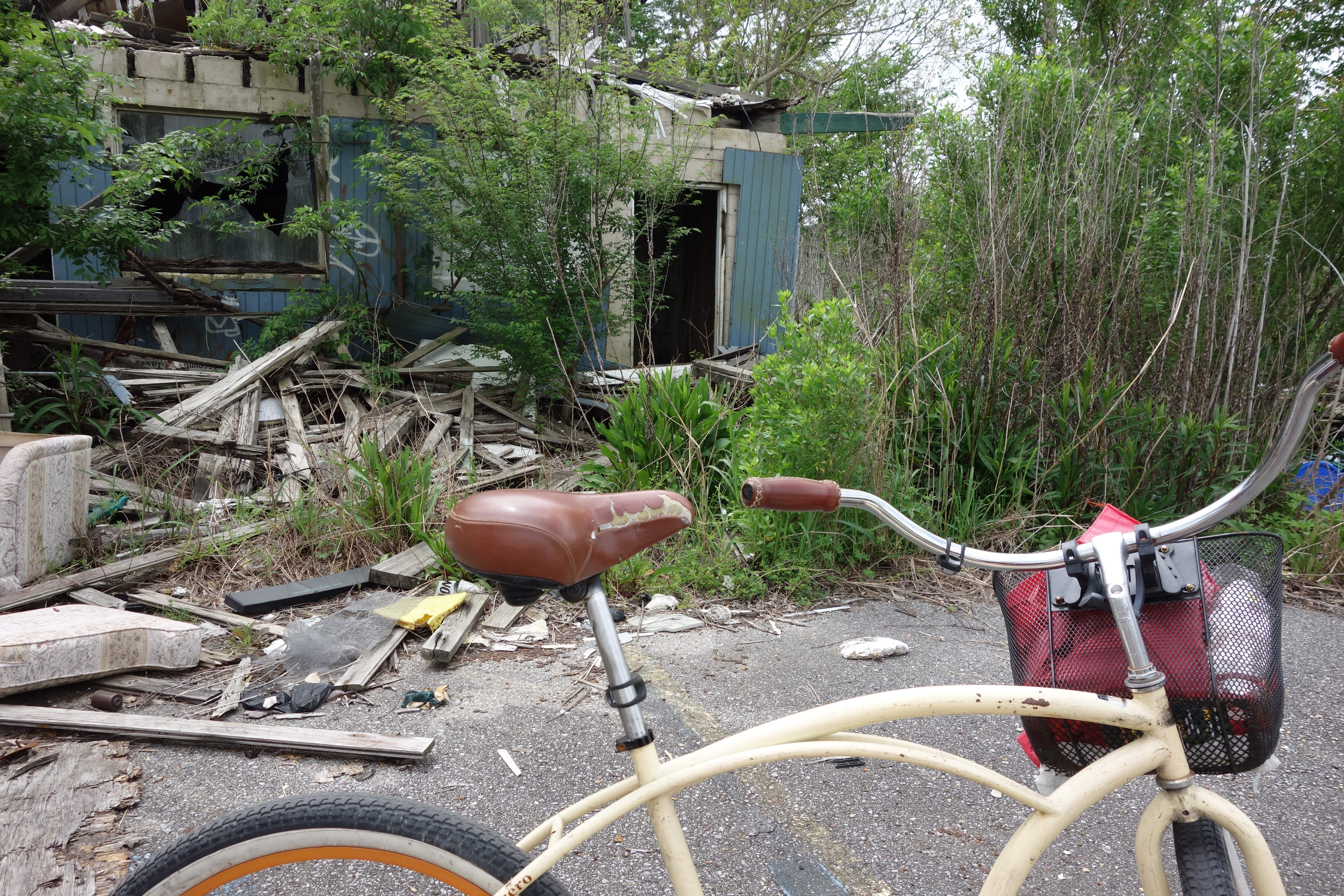 Bike in front of demolished house