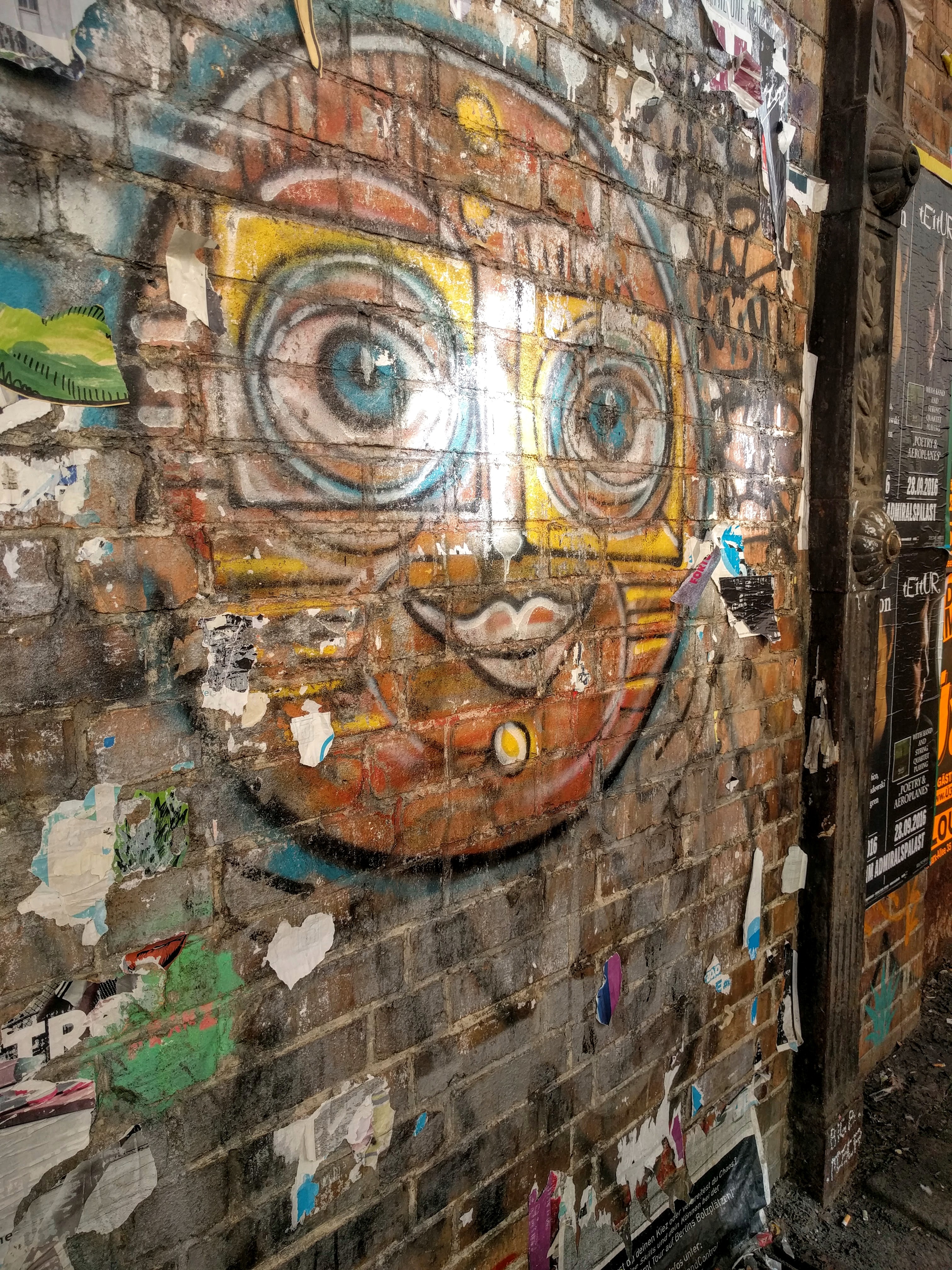 Street art that was covered by posters for 25 years.