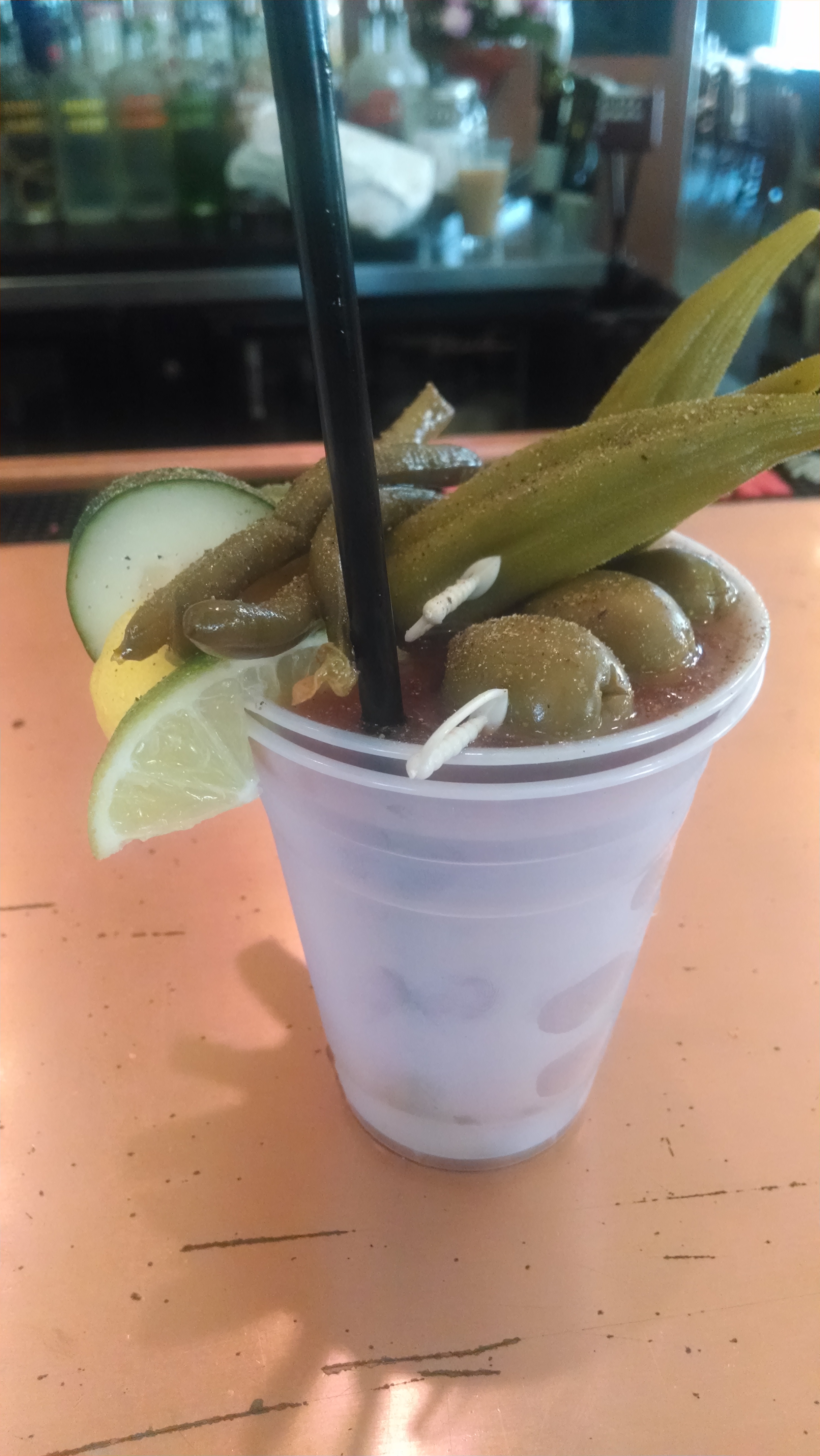 bloody mary in a plastic cup